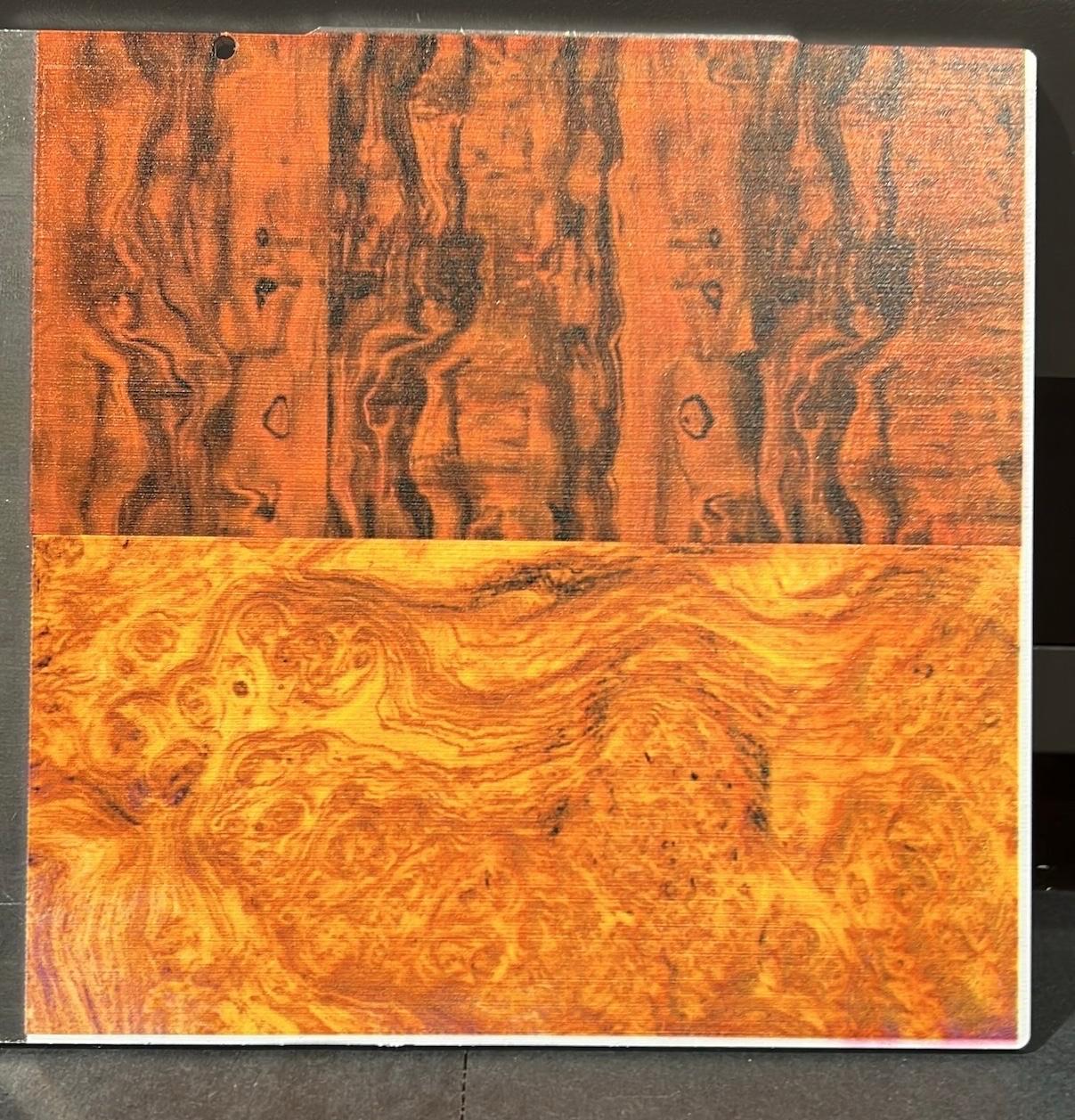 Mahogany above and teak below: two wood-grain appearances UV-printed directly onto aluminum.